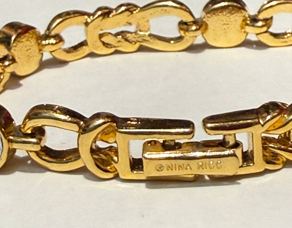 ⚜️ BRACELET VINTAGE NINA RICCI – PLAQUÉ OR & CRISTAUX ⚜️
