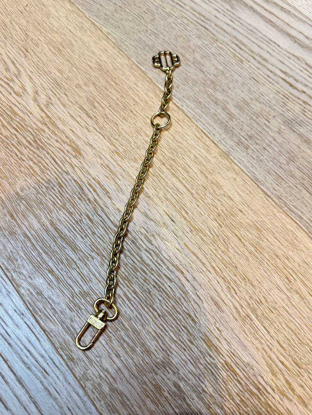 ✨ Neuf 95,00 € — Maje Paris — Bijou de sac & bracelet chaîne doré Trèfle ✨