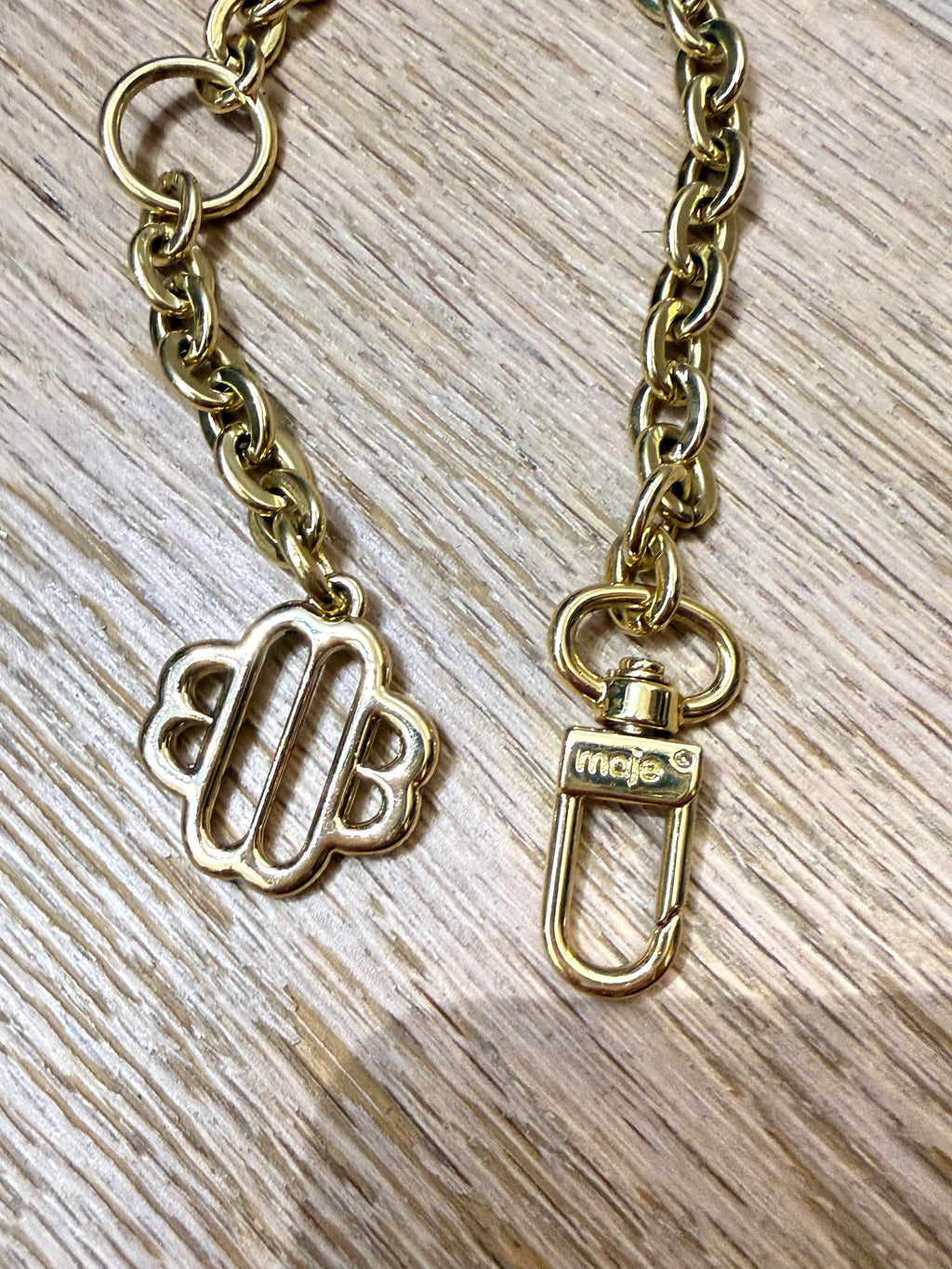 ✨ Neuf 95,00 € — Maje Paris — Bijou de sac & bracelet chaîne doré Trèfle ✨